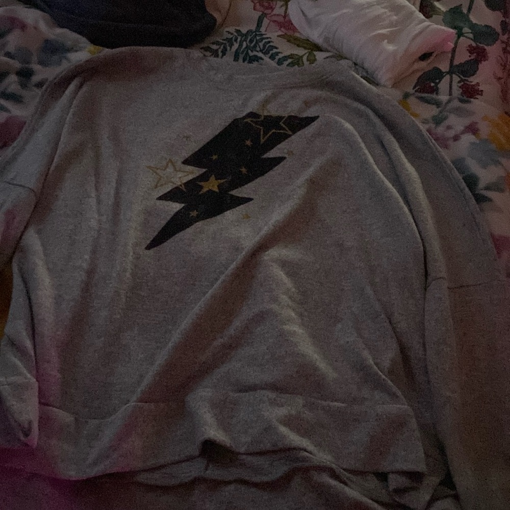 Women’s long sleeve gray with lightening bolt and stars. Very soft.